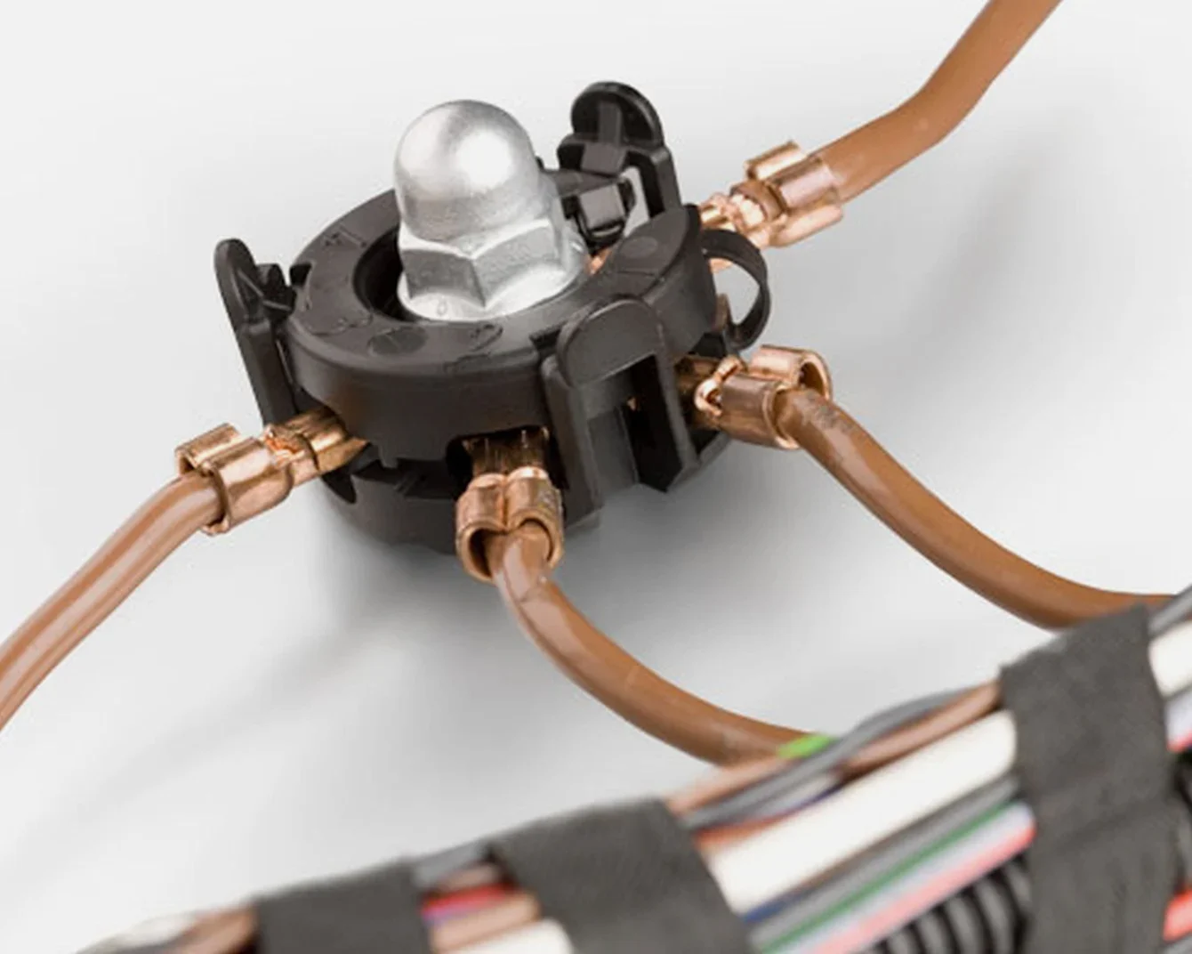 Close-up of a stud welding fastener, creating a connection point for cables